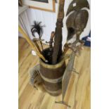 A brass bound coopered oak stickstand, assorted sticks a firescreen etc