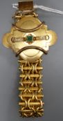 A Victorian yellow metal, emerald and seed pearl set bracelet, with cartouche shaped central