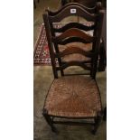 A pair of 19th century ladder-back oak chairs with rush seats