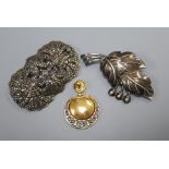 A single 14ct gold earring cast with flowers, a silver and marcasite openwork brooch and a Danish