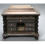 An 18th/19th century Continental ebony veneered table cabinet of drawers (modified)