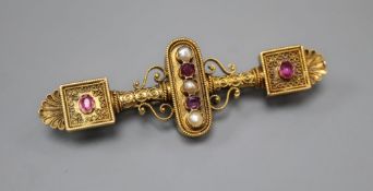 A Victorian Etruscan style gold filigree work brooch, set with pearls and amethysts, 57mm, gross 8