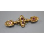 A Victorian Etruscan style gold filigree work brooch, set with pearls and amethysts, 57mm, gross 8