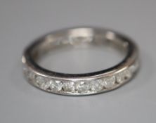 A modern 18ct white gold and diamond set full eternity ring, size M gross 2.6 grams.CONDITION: