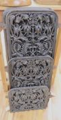 A set of six, possibly French, decorative cast iron panels, wrought and pierced with flowers and