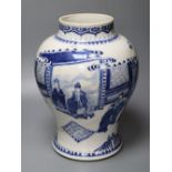 A Chinese Kangxi period blue and white baluster vase, repaired, 35cm