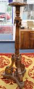 A Georgian style mahogany torchere, height 148cm