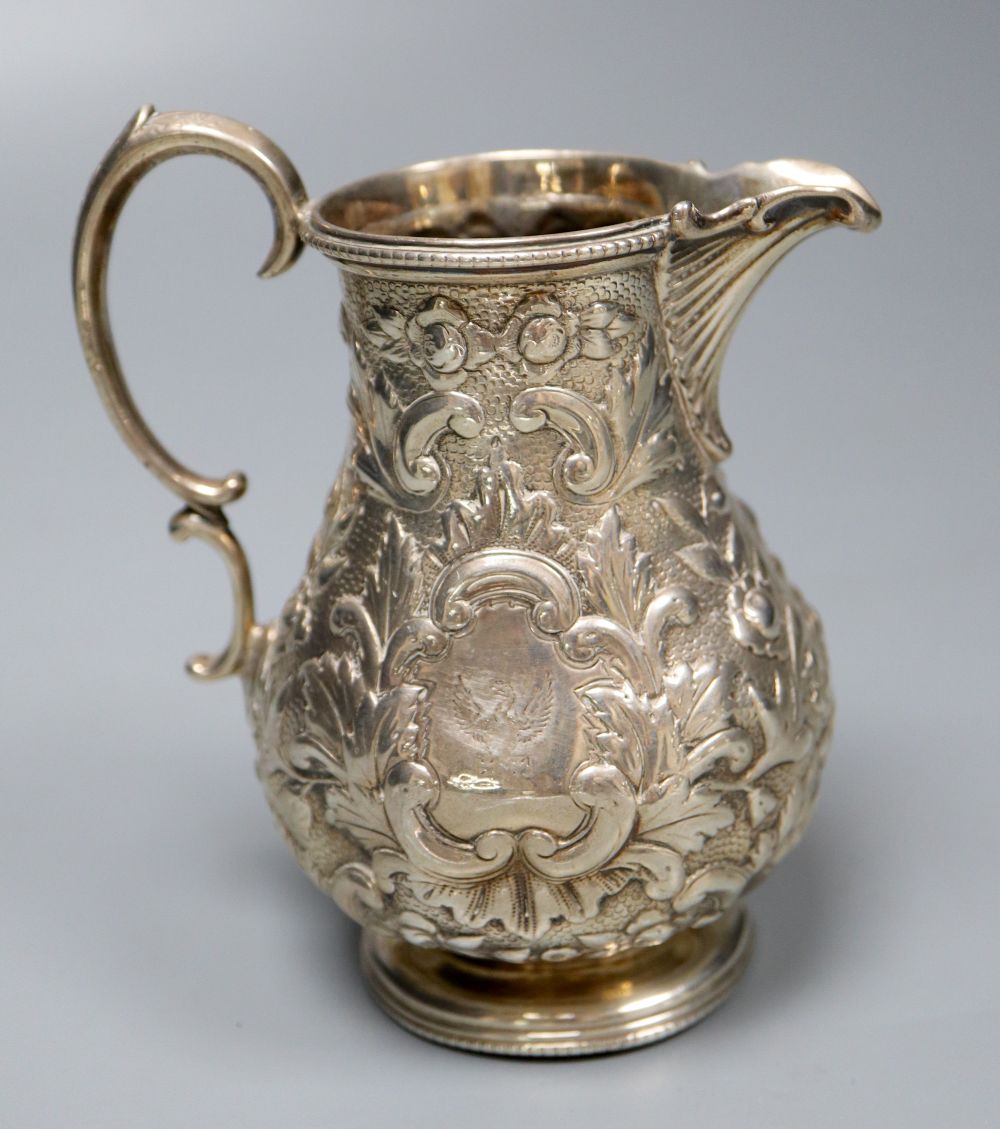 A Victorian embossed silver milk jug, Sheffield, 1860 and a silver salver, London, 1857, 27.5cm, - Image 4 of 6