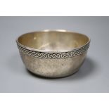 A George V Arts & Crafts Liberty & Co silver bowl with Celtic style border, Birmingham, 1930,