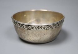 A George V Arts & Crafts Liberty & Co silver bowl with Celtic style border, Birmingham, 1930,