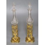 A pair of 19th century cut glass bottles and stoppers in ormolu stands (damage) and sundry other