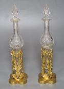 A pair of 19th century cut glass bottles and stoppers in ormolu stands (damage) and sundry other