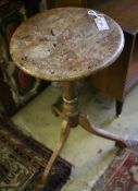 A 19th century elm candle stand, with burr wood top on tripod base, 37cm diameter, 72cm high