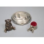 A Tiffany sterling silver circular 'cat' compact, a white metal teddy bear pepper and a pewter teddy