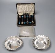A cased set of six silver bean end coffee spoons, a silver cigarette box and two white metal