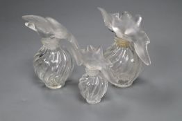 Three Lalique Nina Ricci L'Air du Temps perfume bottles, signed, two height 11cm, one 8cm