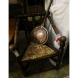 An oak Turners chair and a warming pan