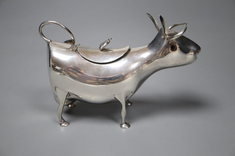 A mid 20th century Dutch white metal cow creamer, length 14cm, gross 145 grams. - Image 2 of 6