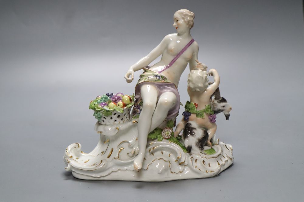 A 19th century Meissen group, Bacchante with putto and goat (damage), possibly part of a