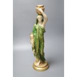 A large Royal Worcester figure of a female water carrier, early 20th century, 52cm