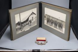 A Military photograph album, 'The Kings Regiment, Egypt 1930', ephemera and medals