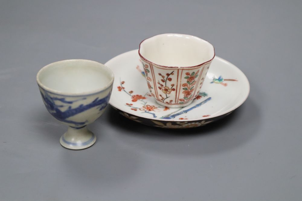 An Arita Dutch decorated saucer, 17th century, a Chinese Dehua Dutch decorated wine cup and a