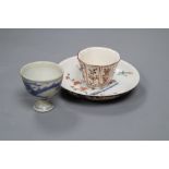 An Arita Dutch decorated saucer, 17th century, a Chinese Dehua Dutch decorated wine cup and a