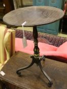 A Regency and later parcel gilt tripod table, 42cm diameter, 70cm high