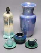 A collection of Ruskin pottery, including a blue lustre vase, a table lamp banded in green, cream