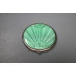 A 1950's silver and green guilloche enamel circular compact, 85mm Birmingham, 1950.