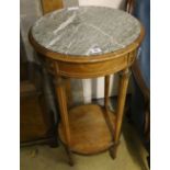 A Haentges Freres, Paris, circular marble top two tier table, diameter 47cm, height 84cm