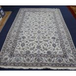 A Persian ivory ground carpet, 300 x 200cm