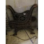 A pair of Victorian Coalbrookdale style cast iron bench ends