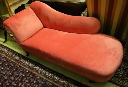 A Victorian chaise longue upholstered in pink velvet, width 180cm, depth 66cm, height 74cm