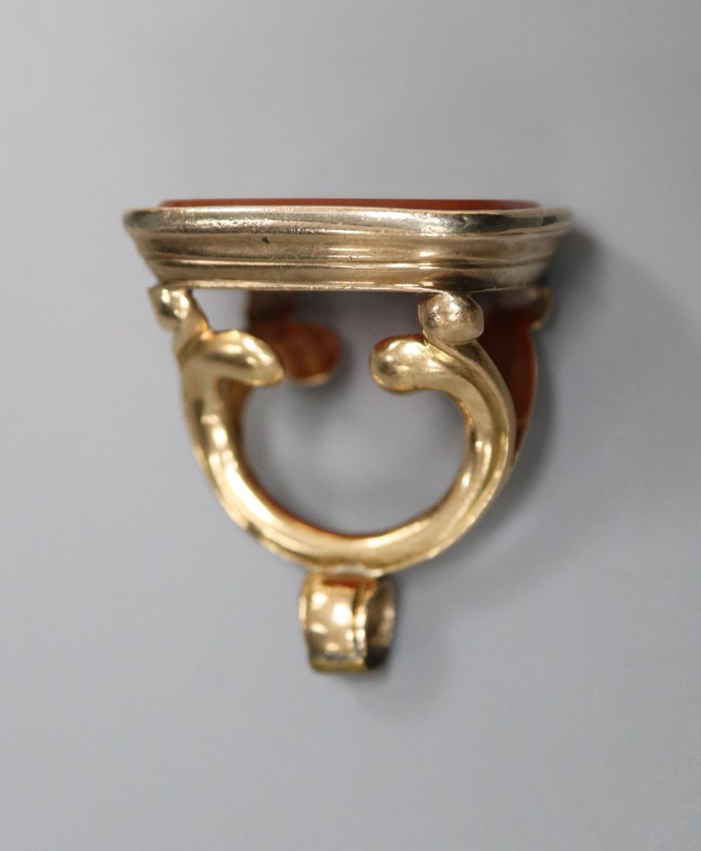 A 19th century gold (tests as 14ct) fob seal with intaglio-cut carnelian matrix, 30mm, gross 15.9 - Image 2 of 3