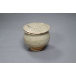 A Chinese Song/Yuan Dynasty Qingbai small jar with 'tiled roof' cover, height 8.5cm