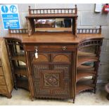A late Victorian aesthetic movement mahogany side cabinet, width 150cm, depth 43cm, height 147cm