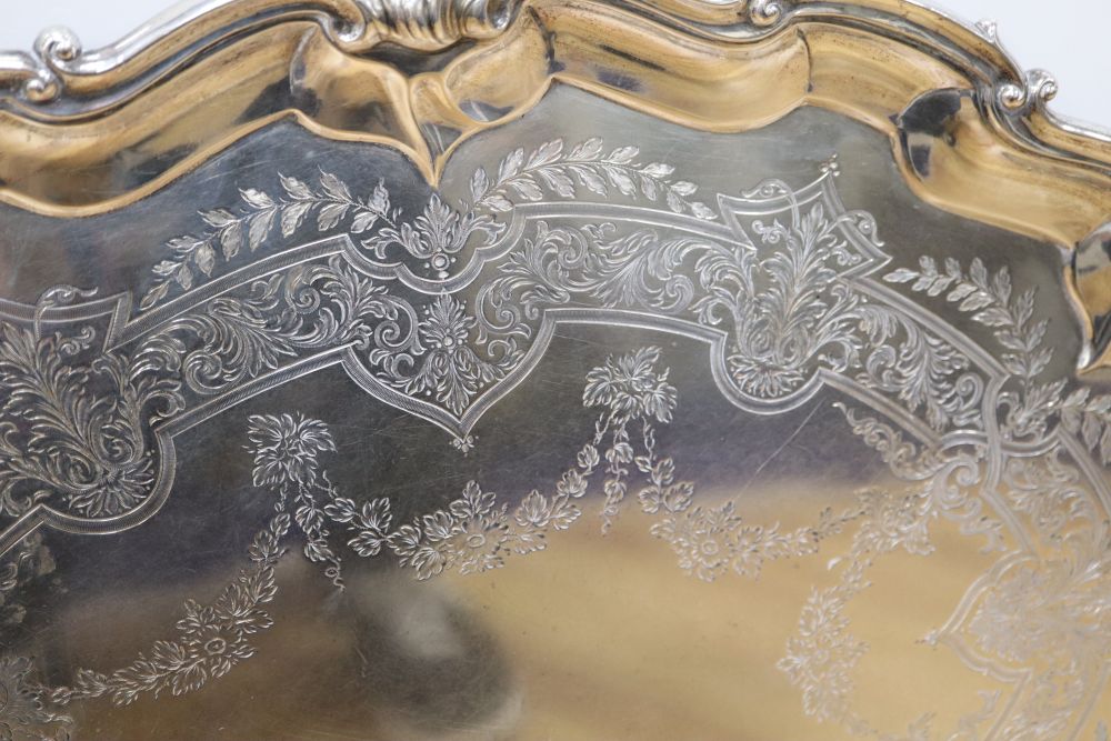 A large shaped oval silver two-handled tray with shell and scroll border, Edward Barnard & Sons, - Image 2 of 5