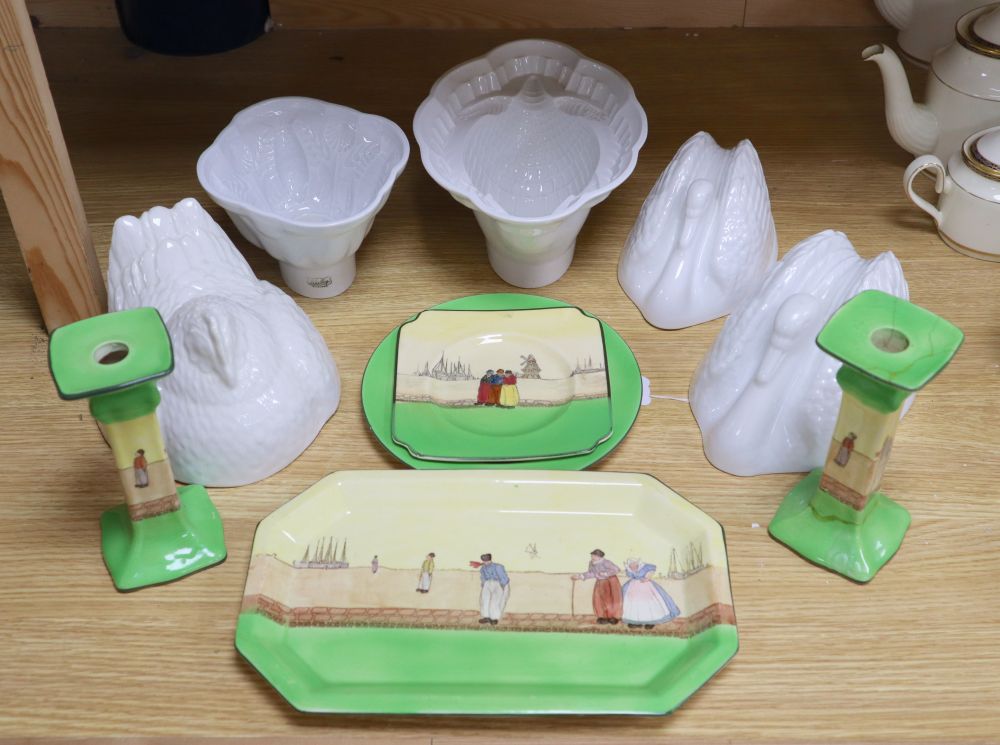 A small collection of Royal Doulton 'Dutch Harlem' seriesware and five white-glazed jelly moulds,