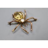 A yellow metal, citrine and split pearl set spider brooch, 36mm, gross 8.4 grams.