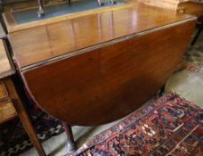 A George III mahogany pad foot oval drop leaf dining table, 170cm extended, width 120cm, height