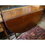 A George III mahogany pad foot oval drop leaf dining table, 170cm extended, width 120cm, height