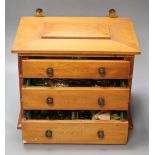 A "Community" silver plated canteen in three drawer pine chest, 36cm