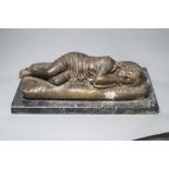 A bronze of a sleeping child