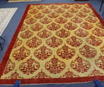 A large Turkish Zeigler style gold ground, red patterned carpet, 500 x 368cm