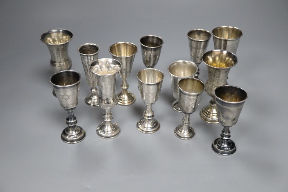 Eleven assorted mainly early 20th century silver kiddush cups and two similar Russian cups, gross