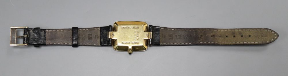 A gentleman's stylish modern silver gilt Dunhill quartz wrist watch, with rectangular Roman dial, on - Image 3 of 4