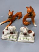 A pair of Goebel ceramic Doberman's, tallest 7.5cm and a pair of miniature Continental Spaniels, 5cm