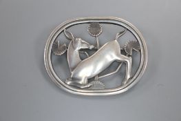 A Georg Jensen sterling 'Kneeling deer' oval brooch, no. 256, 43mm.CONDITION: Overall good