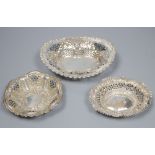 A late Victorian repousse silver bon bon dish and two similar Edwardian dishes, largest 16.8cm,